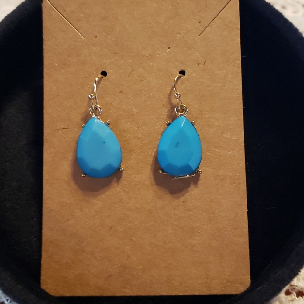 Pretty gold tone earrings w/ blue stone!